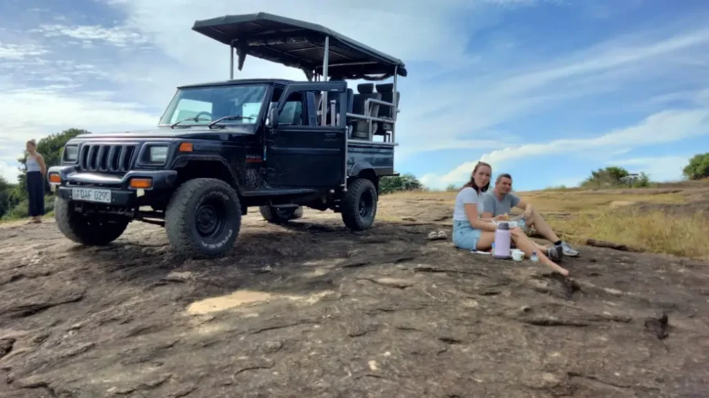 Safari jeep with two couple